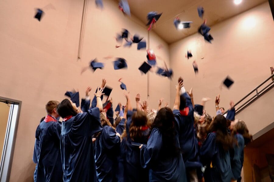 Grad caps flying