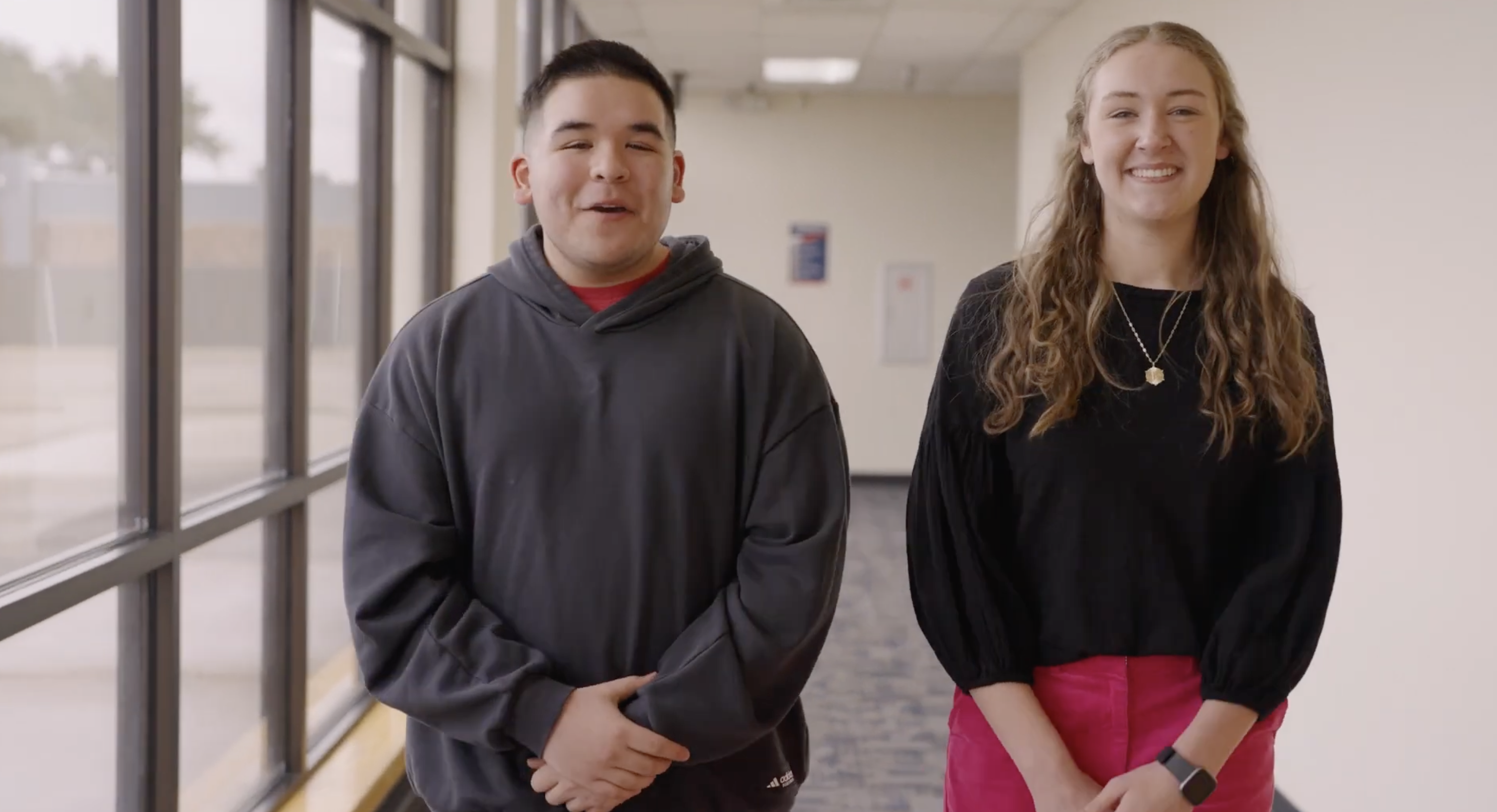 Ezra and Kate giving a high school tour